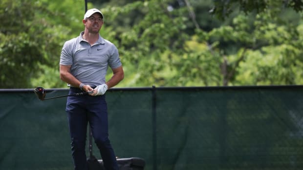 Jun 23, 2022; Cromwell, Connecticut, USA; Rory McIlroy watches his shot from the fourth tee during the first round of the Travelers Championship golf tournament. Mandatory Credit: Vincent Carchietta-USA TODAY Sports